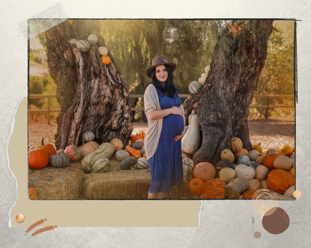 Pregnant mother at the pumpkin patch.